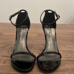 Stuart Weitzman Nudistsong Heel in Black patent leather with a 4 inch heel